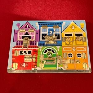 Melissa & Doug Colorful Latches Activity Board